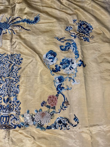 Lot 20 - A Chinese child's blue silk embroidered jacket, early 20th century