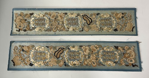 Lot 20 - A Chinese child's blue silk embroidered jacket, early 20th century