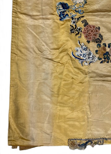 Lot 20 - A Chinese child's blue silk embroidered jacket, early 20th century