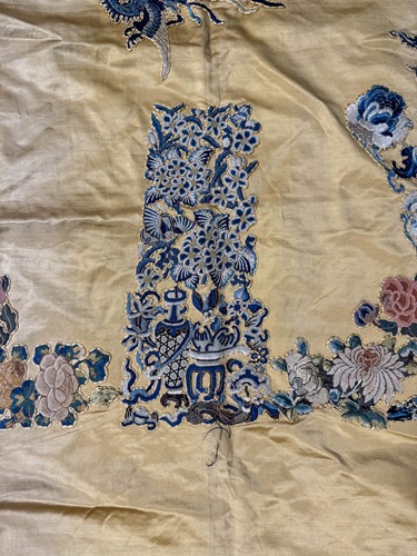Lot 20 - A Chinese child's blue silk embroidered jacket, early 20th century