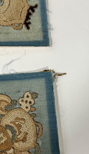 Lot 20 - A Chinese child's blue silk embroidered jacket, early 20th century
