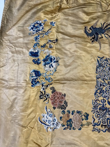 Lot 20 - A Chinese child's blue silk embroidered jacket, early 20th century