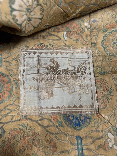 Lot 21 - A Chinese silk embroidered dragon panel, perhaps 17th or 18th century