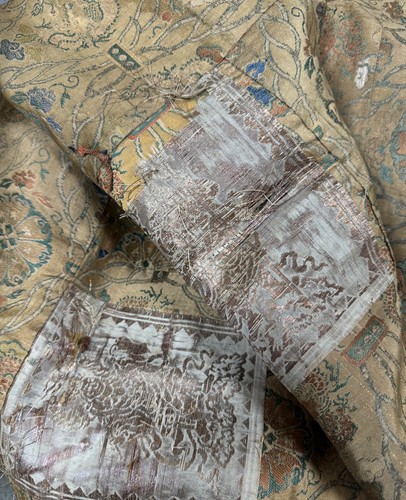 Lot 21 - A Chinese silk embroidered dragon panel, perhaps 17th or 18th century