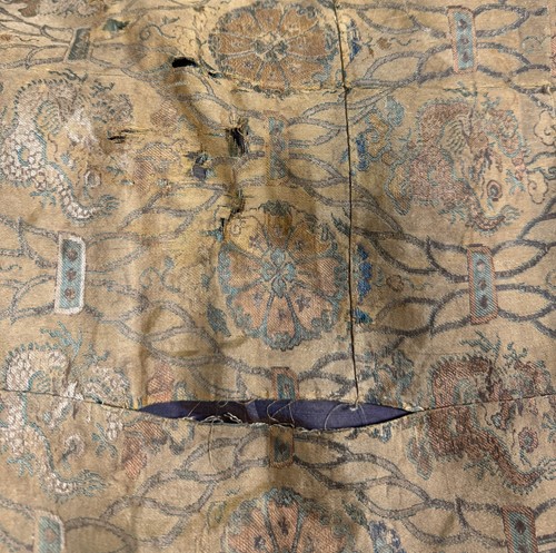 Lot 21 - A Chinese silk embroidered dragon panel, perhaps 17th or 18th century