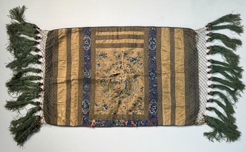 Lot 22 - A Chinese silk embroidered Manchu panel, late Qing Dynasty, circa 1890