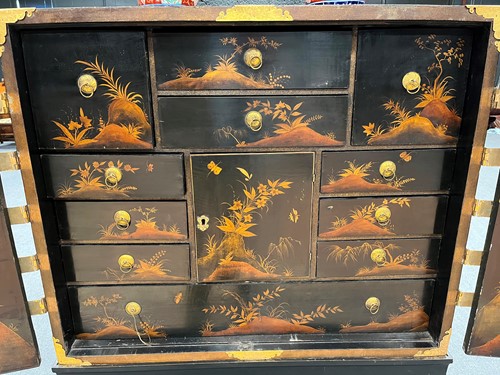 Lot 472 - A Chinoiserie black and gilt lacquered cabinet on stand, 19th century