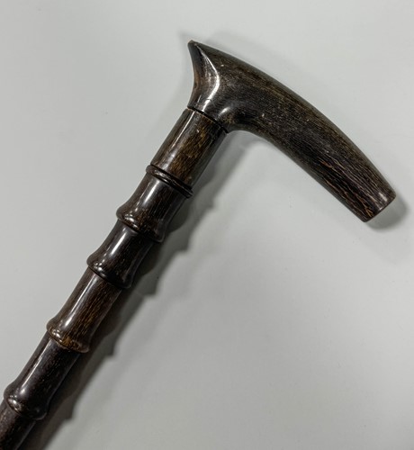 Lot 18 - A sectional walking cane, possibly rhino horn, early 20th century