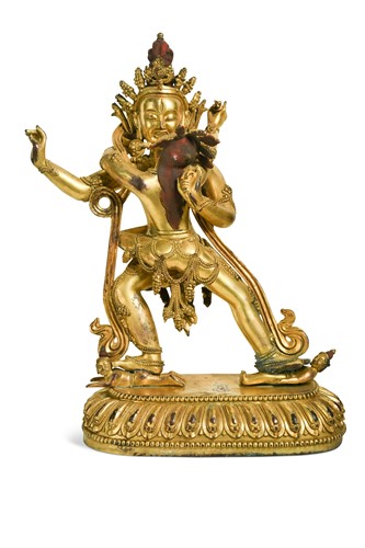 Lot 55 - A Tibetan-style gilt bronze figure of Samvara with his paredra Yab-yum, 20th century