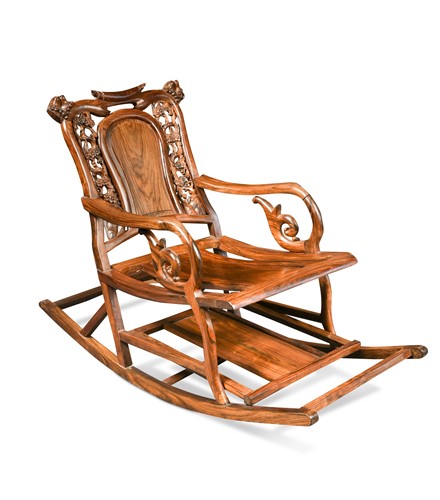 Lot 36 - A Chinese hardwood rocking chair, possibly huanghuali, 20th century