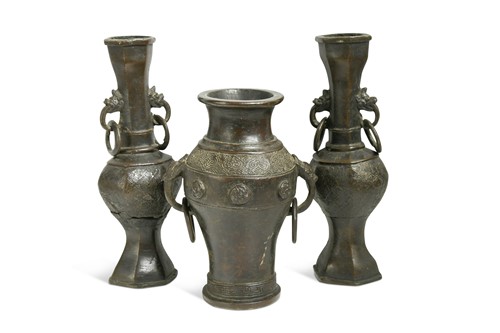 Lot 24 - A pair of early Ming bronze hollow vases, of archaic style