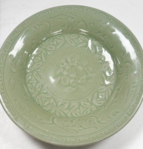 Lot 1 - A Chinese Longquan celadon-glazed dish, Ming Dynasty, 15th/16th century