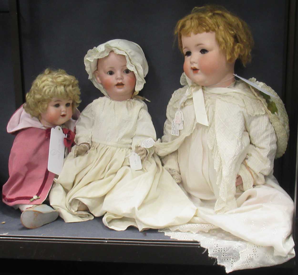 Lot 78 - Three large bisque-head dolls: bisque-head...