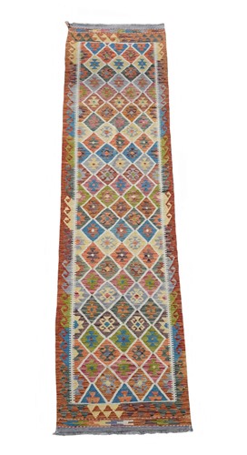 Lot 309 - An Anatolian style long flatweave kilim runner, modern