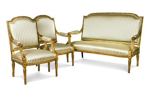 Lot 566 - A French Louis XVI style giltwood salon suite, 19th century