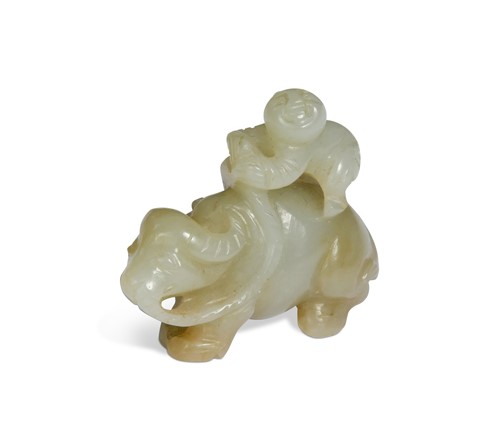 Lot 31 - A Chinese mutton fat jade small carving of a boy and water buffalo, late Qing Dynasty