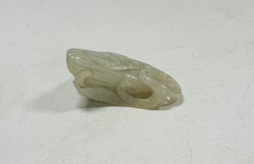Lot 33 - A Chinese carved jade melon, Qing Dynasty 19th century