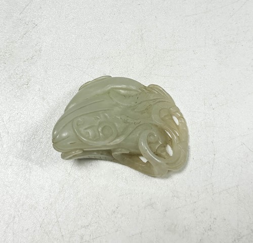Lot 33 - A Chinese carved jade melon, Qing Dynasty 19th century