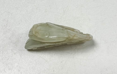 Lot 33 - A Chinese carved jade melon, Qing Dynasty 19th century