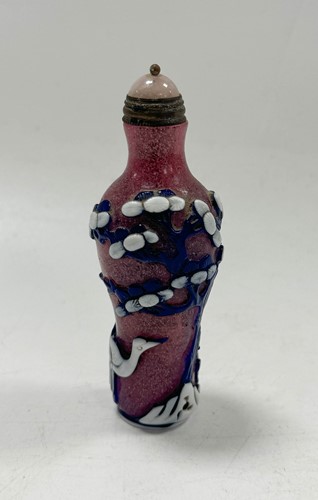 Lot 16 - A Chinese Peking overlay glass snuff bottle, circa 1900