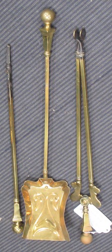 Lot 70 - Set of early 20th century brass fire irons...