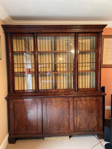 Lot 469 - A figured mahogany bookcase cabinet, 19th...