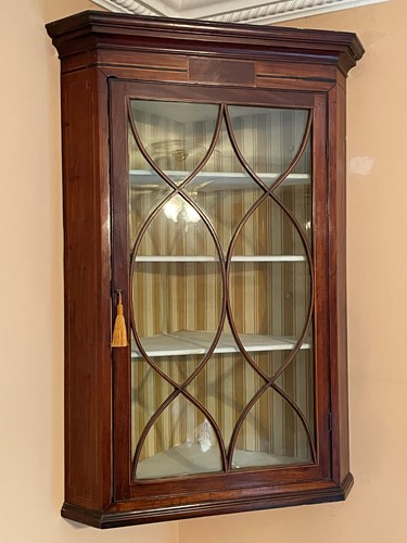 Lot 673 - Three George III corner cupboards and an...