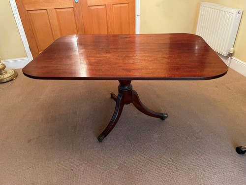 Lot 471 - A Regency mahogany breakfast table, rounded...