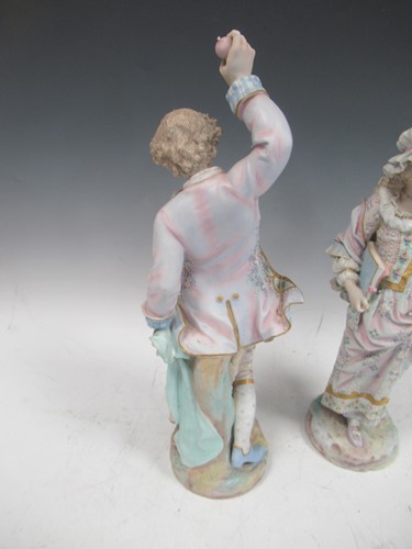 Lot 21 - A pair of French bisque porcelain figures by...