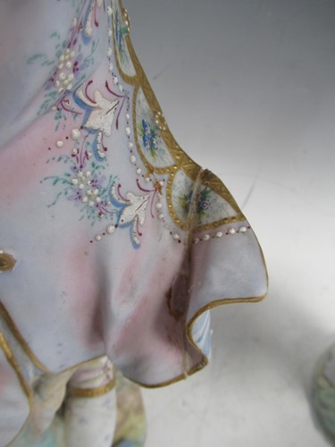 Lot 21 - A pair of French bisque porcelain figures by...