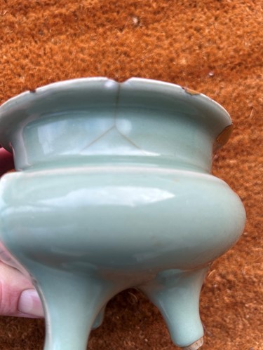 Lot 3 - A Chinese Longquan celadon-glazed tripod censer, South Song Dynasty (1127-1279)