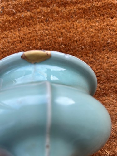 Lot 3 - A Chinese Longquan celadon-glazed tripod censer, South Song Dynasty (1127-1279)
