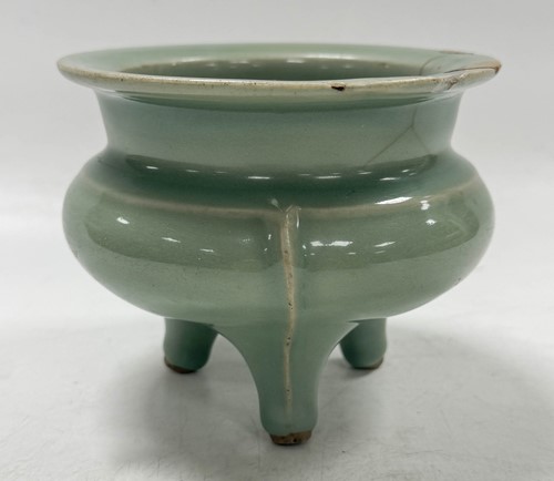 Lot 3 - A Chinese Longquan celadon-glazed tripod censer, South Song Dynasty (1127-1279)