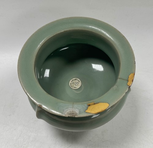 Lot 3 - A Chinese Longquan celadon-glazed tripod censer, South Song Dynasty (1127-1279)