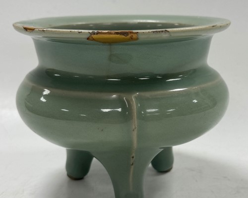 Lot 3 - A Chinese Longquan celadon-glazed tripod censer, South Song Dynasty (1127-1279)
