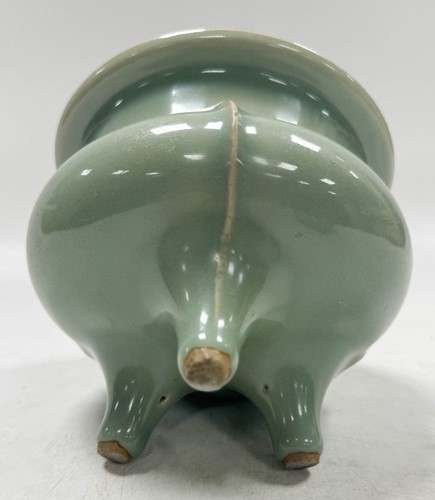 Lot 3 - A Chinese Longquan celadon-glazed tripod censer, South Song Dynasty (1127-1279)