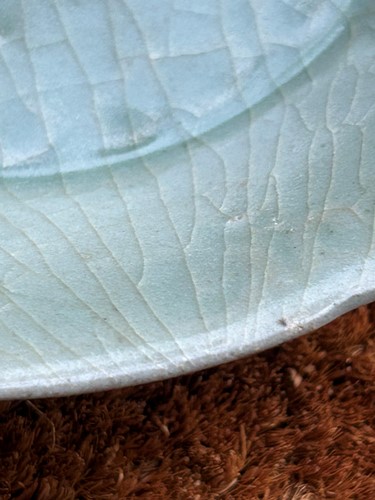 Lot 4 - A Chinese Longquan celadon-glazed mallow bowl, Southern Song Dynasty (1127-1279)