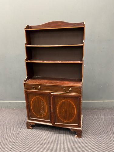 Lot 617 - A Regency style mahogany waterfall bookcase...
