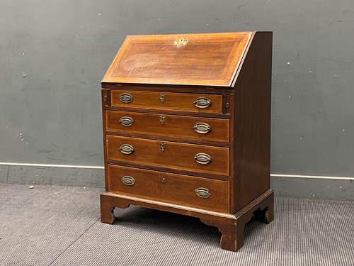 Lot 591 - An Edwardian mahogany and cross-banded bureau...
