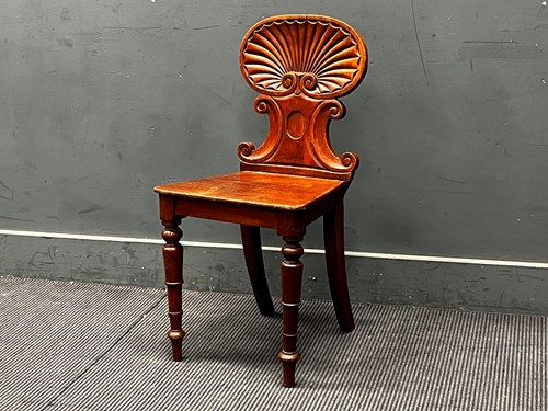 Lot 454 - A 19th century mahogany hall chair with...
