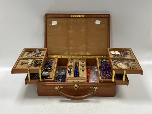 Lot 188 - A jewellery box containing a large collection...