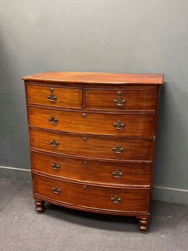 Lot 345 - A 19th century mahogany bow front chest of two...