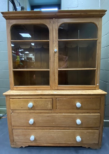 Lot 388 - A Victorian pine glazed bookcase two arched...