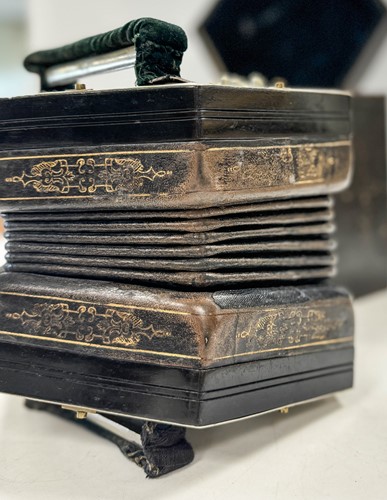 Lot 587 - Jeffries Bros., a fifty-eight key Duet concertina, late 19th or early 20th century