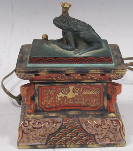 Lot 5 - A china table lamp, modelled as a frog seated...