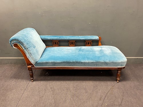 Lot 387 - A blue velvet upholstered and oak framed...
