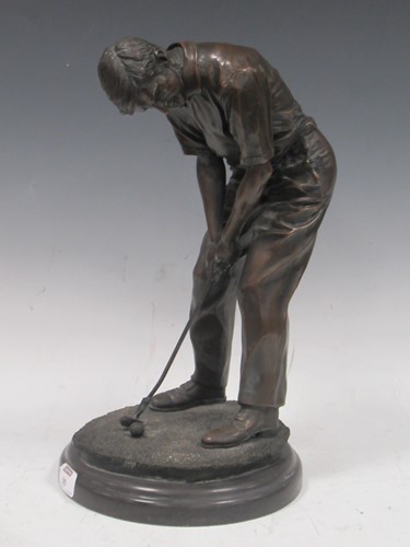 Lot 90 - A modern bronze figure of a golfer