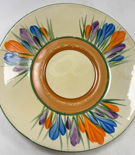 Lot 33 - A Clarice Cliff 'Crocus' pattern conical tea-for-two set