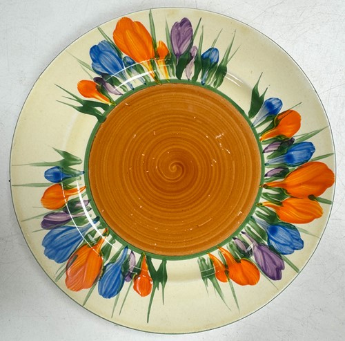 Lot 33 - A Clarice Cliff 'Crocus' pattern conical tea-for-two set