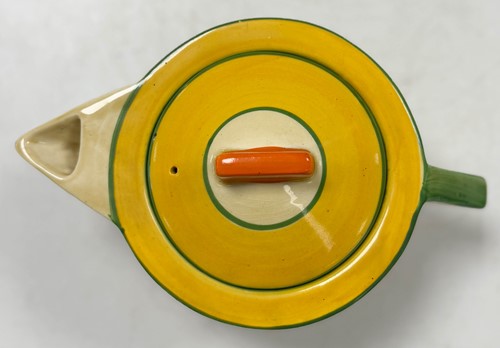 Lot 33 - A Clarice Cliff 'Crocus' pattern conical tea-for-two set